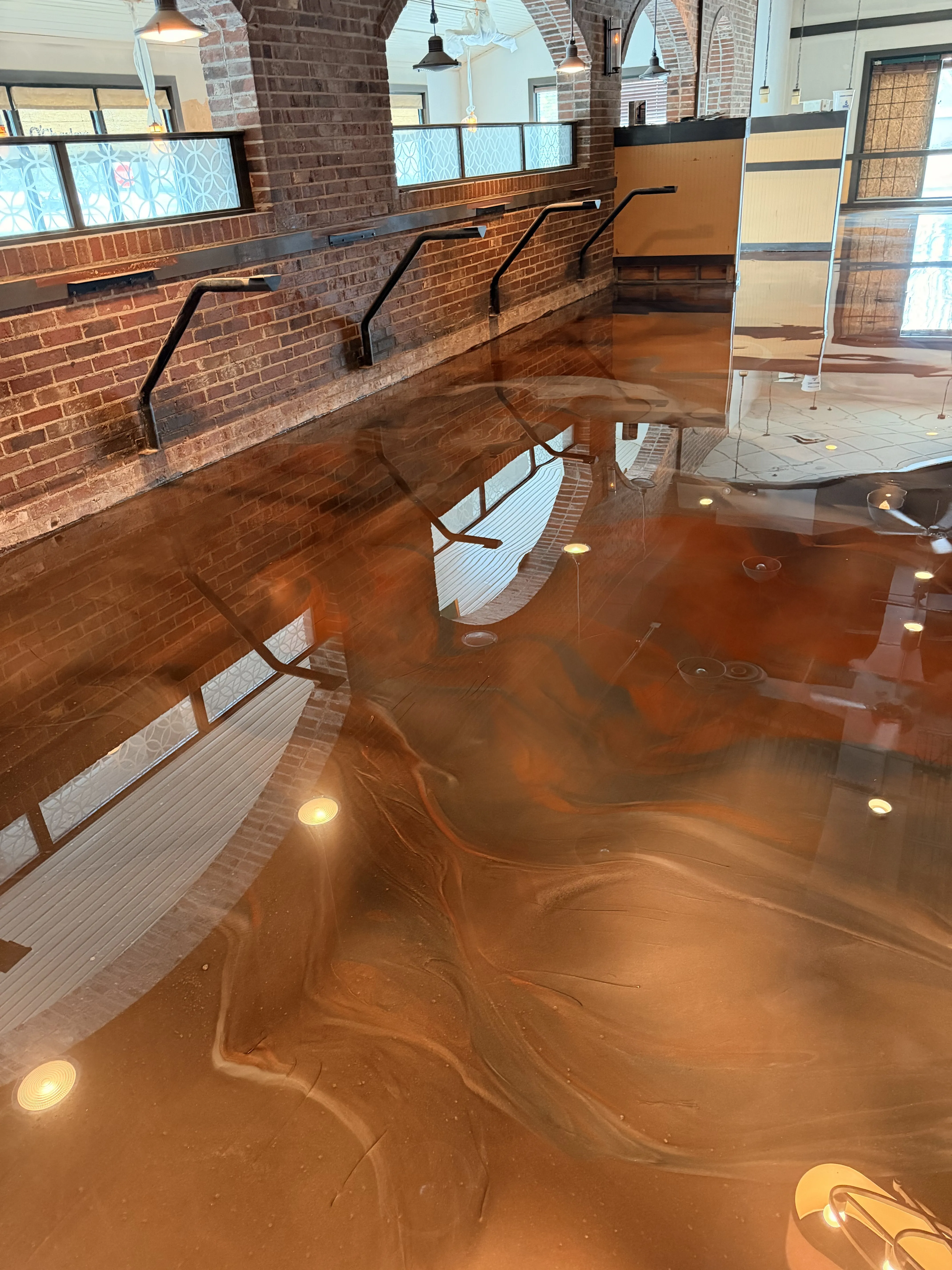 Metallic epoxy floor installation by ACE Luxury Epoxy Floors in Metro Atlanta